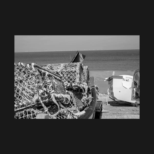 Lobster and crab pots on a fishing boat on the Norfolk coast by yackers1