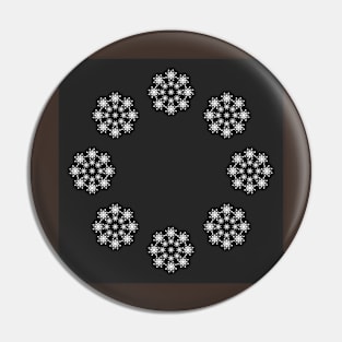 Snow flakes on grey background Pin