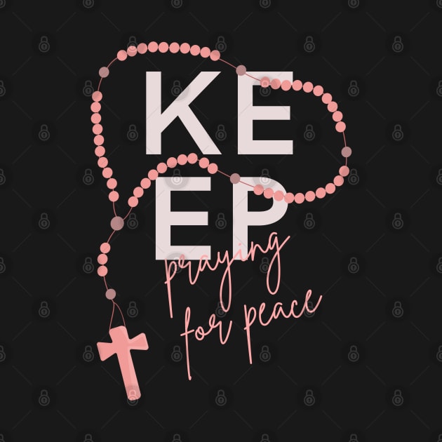 Keep Praying for Peace typography and rosary beads by Brasilia Catholic