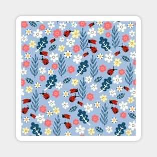 Spring meadow in bloom with ladybirds on sky blue background Magnet