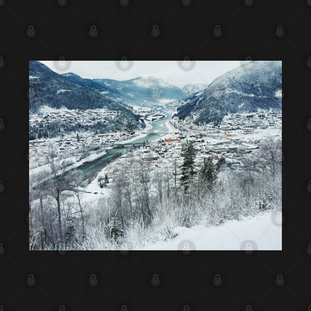 Wintertime - View on Snow-Covered Scandinavian Valley and Town by visualspectrum