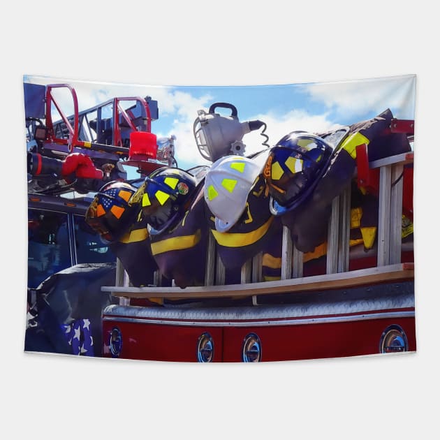 Firefighters - Helmet on Fire Truck Tapestry by SusanSavad