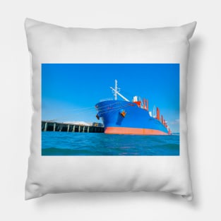 Large blue and red ship in port. Pillow