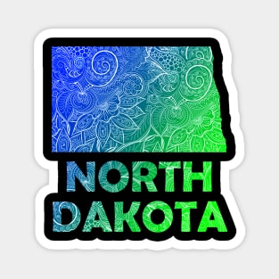 Colorful mandala art map of North Dakota with text in blue and green Magnet