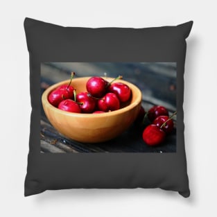 A bowl of cherries. Pillow