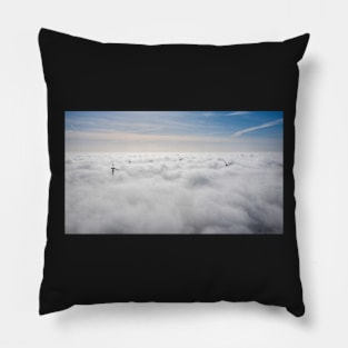 Wind farms sticking out above the clouds Pillow