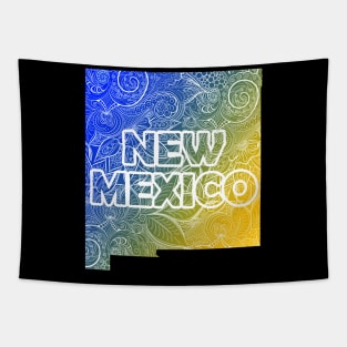 Colorful mandala art map of New Mexico with text in blue and yellow Tapestry