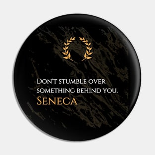 Embrace Stoic Wisdom: 'Don't stumble over something behind you.' -Seneca Design Pin