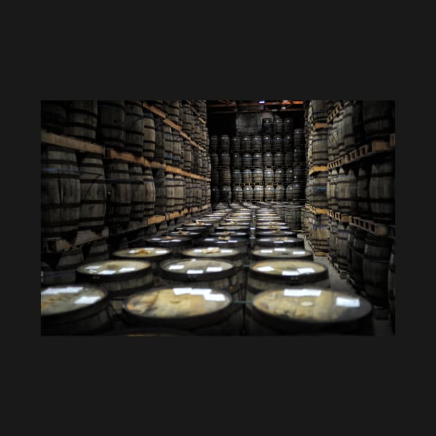 Whisky casks stored in a Whisky warehouse, Scotland by richflintphoto