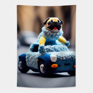 A knitted pug dog driving a woolly convertible car Tapestry