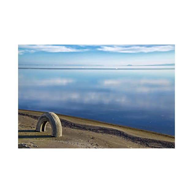 Tire on a Beach by jswolfphoto