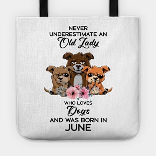 Never Underestimate An Old Woman Who Loves Dogs And Was Born In June Tote