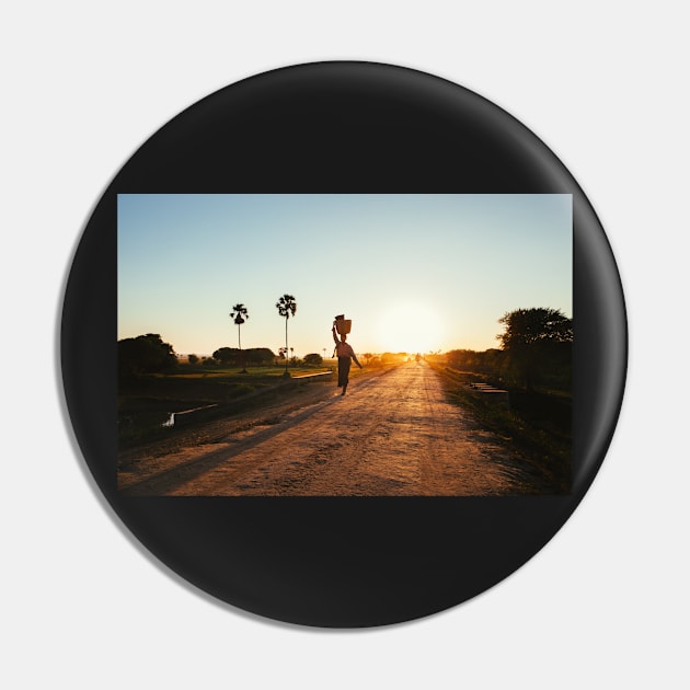 Woman Carrying Baskets on Head Walking in Burmese Countryside at Sunset Pin by visualspectrum