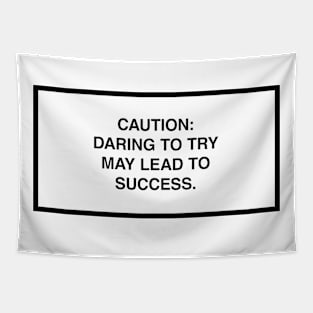 Caution: Daring to try may lead to success. Tapestry