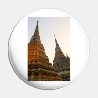 Third view of two stupa against sky at Wat Pho Pin