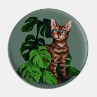 a Bengal cat with a plant Pin