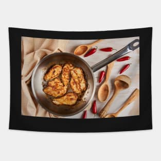 Chicken breast cooking in stainless steel pan Tapestry