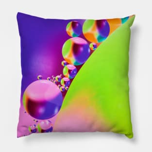 Colorful close up of oil drops in water Pillow