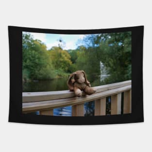 Little bear soft toy sitting on the fence Tapestry