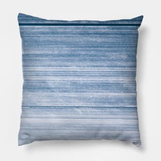 Streaks of blue paint on a highly texture wall Pillow