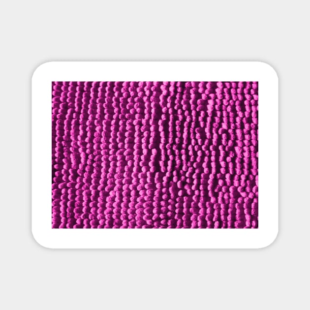 Pink knitted fabric Magnet by oscargml