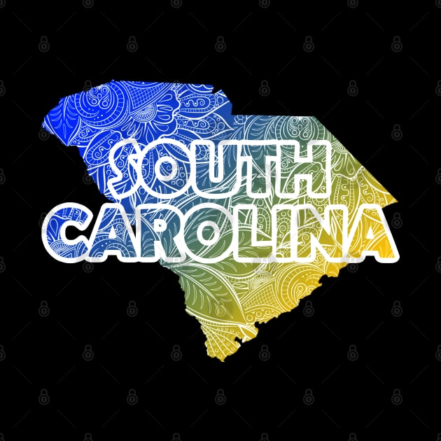 Colorful mandala art map of South Carolina with text in blue and yellow by Happy Citizen