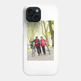 Active senior couple walking bicycles in park (F023/0128) Phone Case