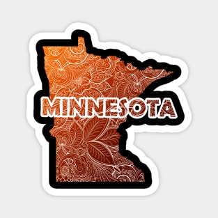 Colorful mandala art map of Minnesota with text in brown and orange Magnet