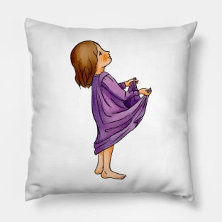 Cute little blond toddler girl in purple jammies is ready to catch something in her held out pyjamas. Pillow