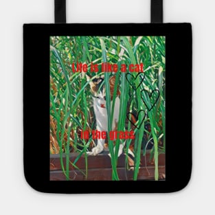 Life is like a cat in the grass Tote