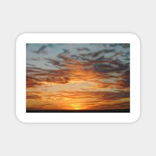 beautiful patterned golden glow with elegant cloudscape at sunset Magnet