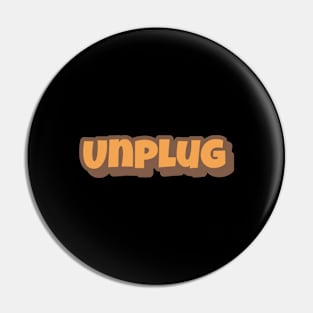 Unplug Big Playfull Font Design with Orange and Brown Pin