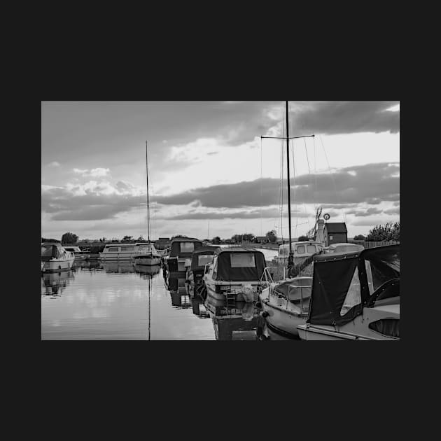 Boats moored in Thurne Dyke in the Norfolk Broads National Park by yackers1