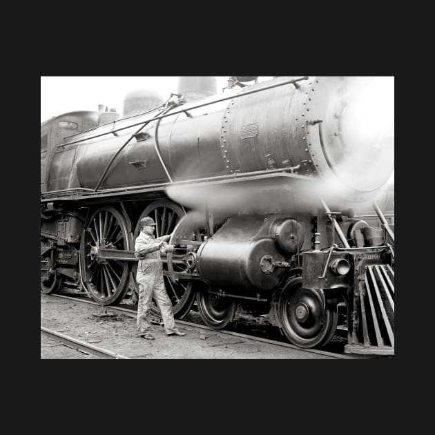 Engineer Oiling Locomotive, 1904. Vintage Photo by historyphoto