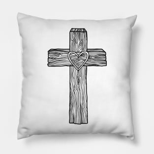 A wooden cross with a heart in the center Pillow