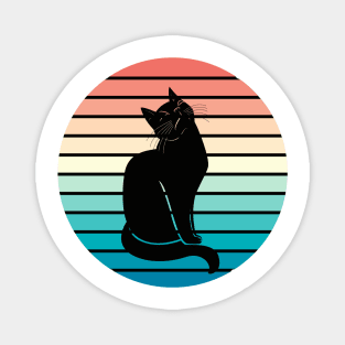 Black cat watching sunset Magnet