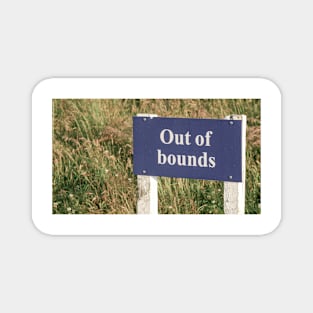 Out of bounds sign white lettering on blue on golf course. Magnet