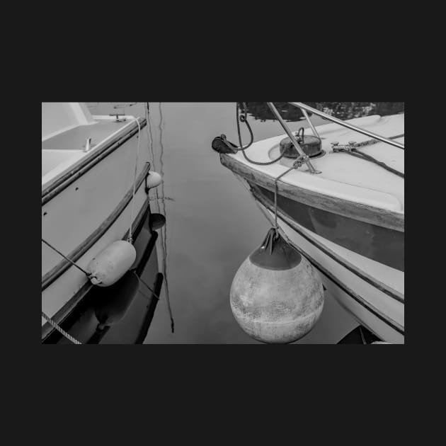 Close up of boats moored on the River Thurne, Norfolk Broads by yackers1