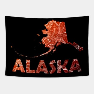 Colorful mandala art map of Alaska with text in brown and orange Tapestry