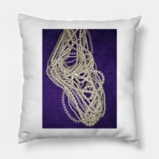 Pearls and beads on a purple background Pillow