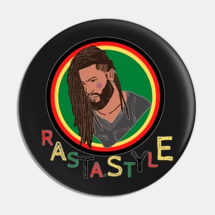 Rastafari man accompanied by a multicolored writing Pin