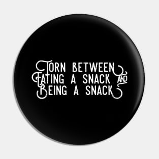 Torn between eating a snack and being a snack white distressed text design Pin