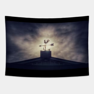 Weathervane Against Storm Clouds Tapestry