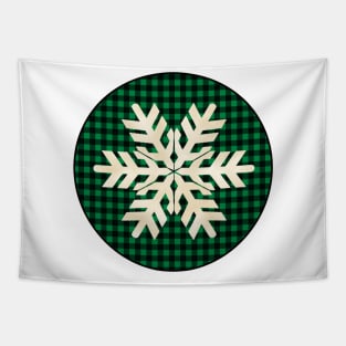 Snowflake silhouette over a black and green tile pattern Tapestry