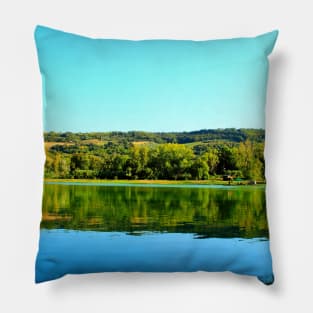 View from Lago Cedri in Lapedona with the surface of water extending over the picture and reflecting vegetation Pillow