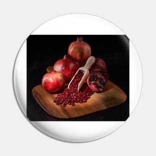 Fresh pomegranate fruits and seeds Pin