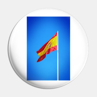 Spanish flag waving against clear blue sky Pin