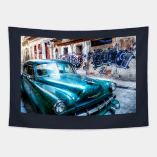 Old green American car on the streets of Havana Cuba Tapestry