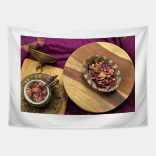 Top down view of Rose tea in a cup with a tea kettle Tapestry