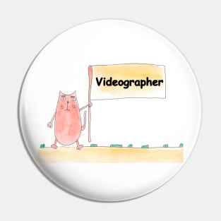 Videographer. Profession, work, job. Cat shows a banner with the inscription. Watercolor illustration. A gift for a professional. Pin